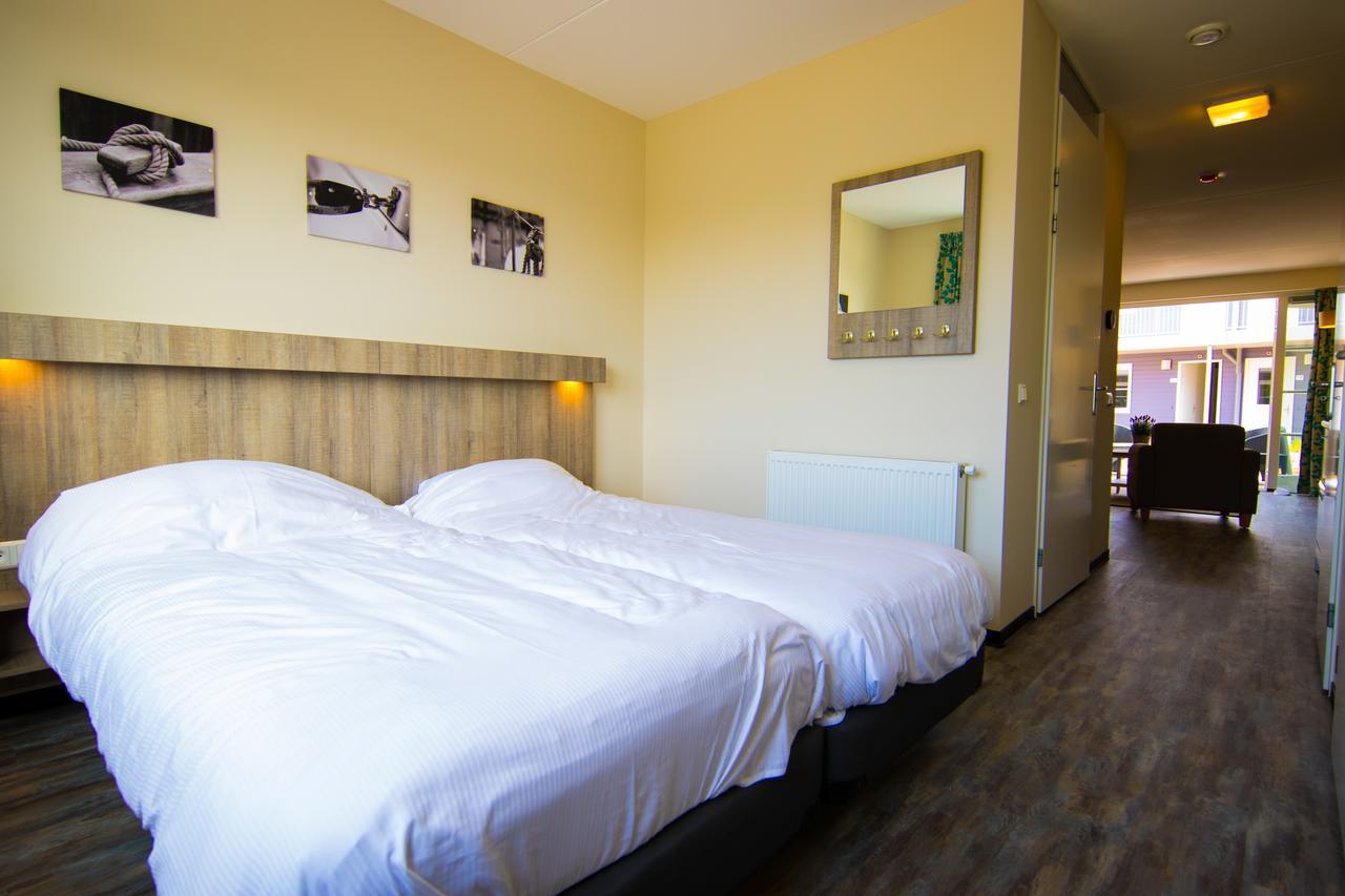 Roompot Strandplevier Hotelsuites De Koog  Ruang foto