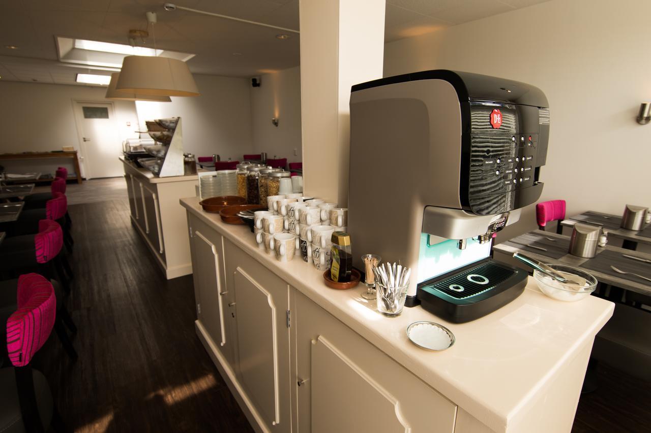 Roompot Strandplevier Hotelsuites De Koog  Bagian luar foto